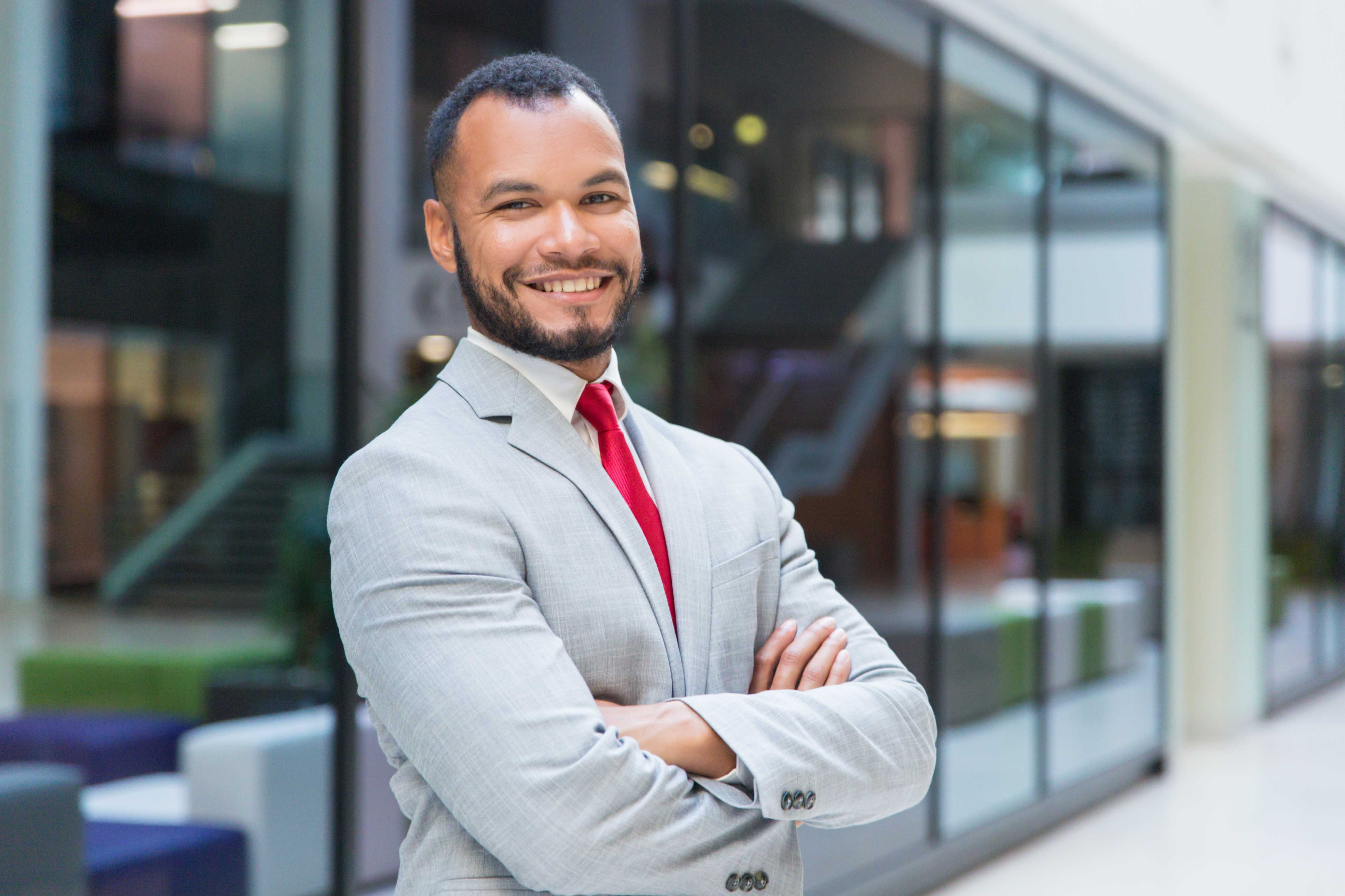 cheerful-businessman-smiling-1 cheerful-businessman-smiling-1